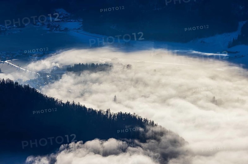 View of a sea of fog from Vormauerstein, Strobl am Wolfgangsee, church tower sticking out of the fog, inversion weather, Osterhorn Group, Salzkammergut, Province of Salzburg, Austria
