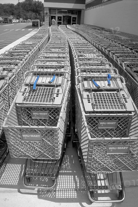 Shopping trolleys pushed together in front of a supermarket, black and white, Newton, New Jersey, USA