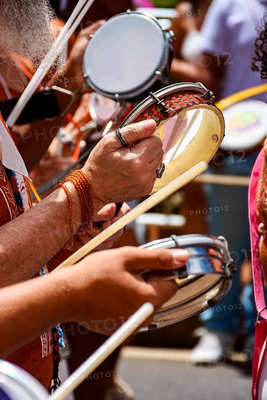 Tambourines and musicians during a carnival celebration in the streets of Brazil, Belo Horizonte, Minas Gerais, Brazil