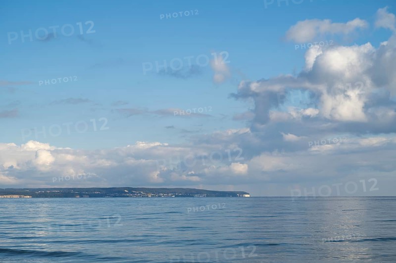 View across the Baltic Sea towards the chalk coast, sky with white clouds, Binz, seaside resort, Rügen island, Mecklenburg-Western Pomerania, Germany