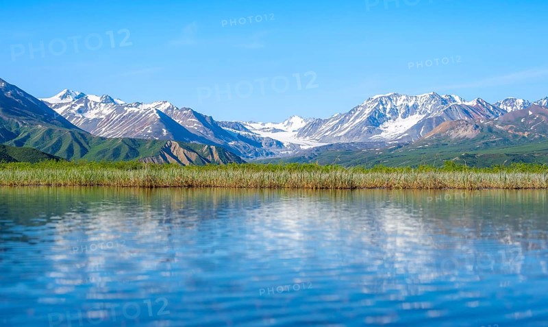Lake and picturesque mountain landscape with Gulkana glacier and summit Icefall Peak, Richardson Highway, Alaska Range, Alaska, USA