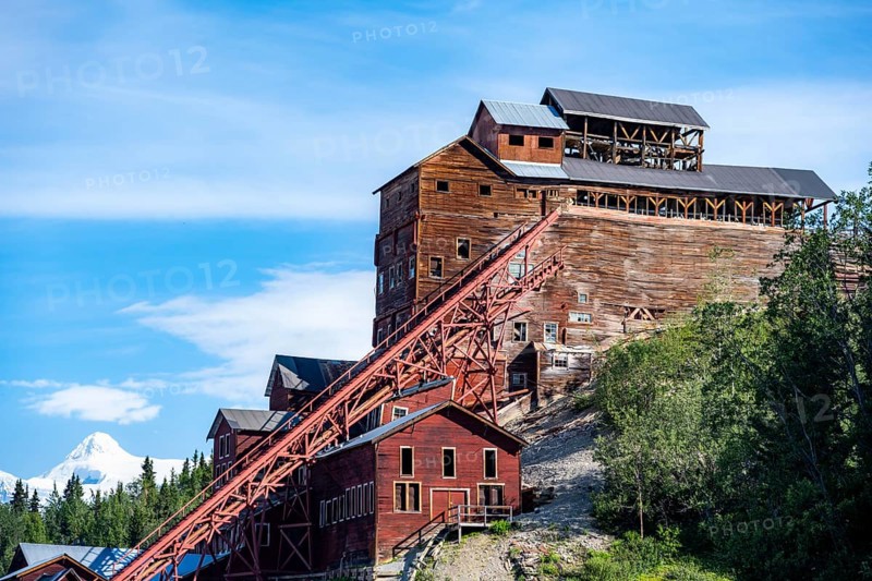 Red dilapidated buildings of Kennicott, Kennicott Concentration Mill to extract copper from quarried rock, Historic Kennecott Copper Mine, National Historic Landmark, Wrangell St. Elias National Park, Alaska, USA