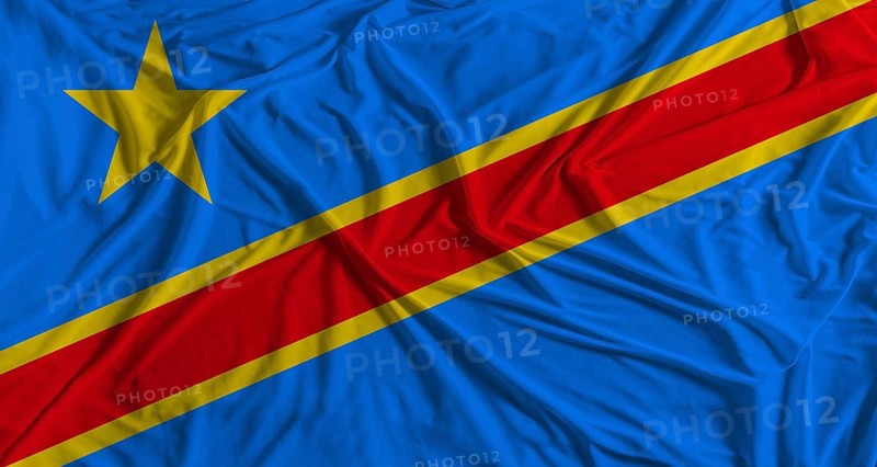 Democratic Republic of the Congo flag with fabric texture background. National flag of the Democratic Republic of the Congo with cloth texture