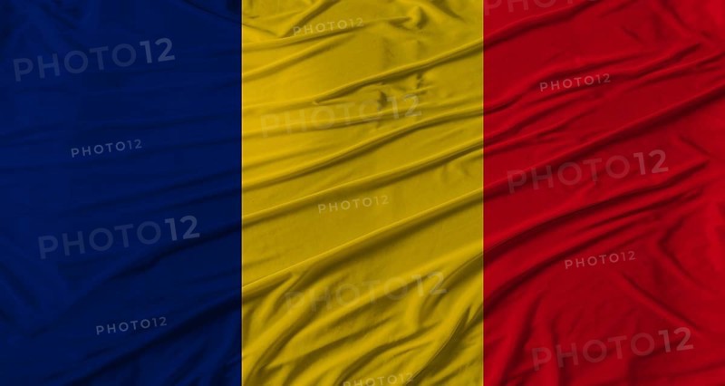 Chadian flag waving. Flag of Chad with cloth texture