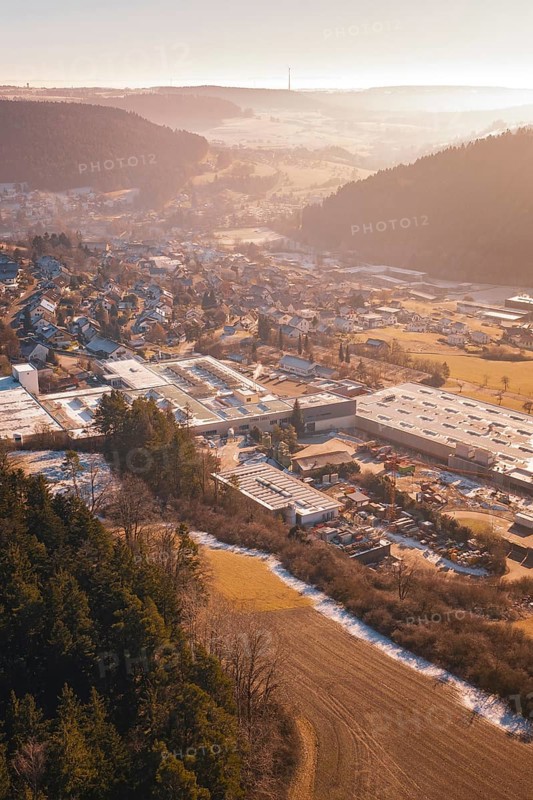 Industrial area in wooded, hilly landscape, Glatten, Freudenstadt district, Germany