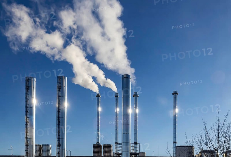 Smoking chimneys. Stainless steel fireplaces Symbolic photo. Böblingen, Baden-Württemberg, Germany