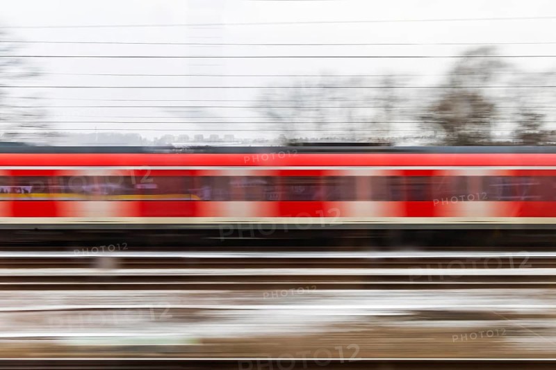 S-Bahn on the open route. motion blur. Esslingen, Baden-Württemberg, Germany