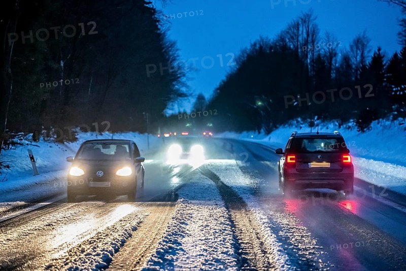 Country road with snow and slush Bergisches Land, near Marienheide, North Rhine-Westphalia, Germany