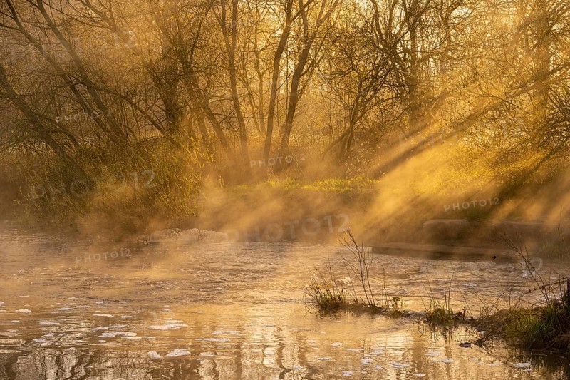Fish ladder at sunrise with light rays on the Hunte near the weir in Bühren, Colnrade, Bühren, Lower Saxony, Germany