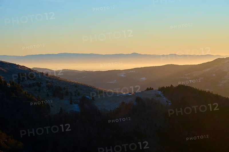 Sunrise over mountain landscape with rolling hills, fog and thick forests, morning, view, Rhine Valley, Martinswand, Frankental, Vosges, France