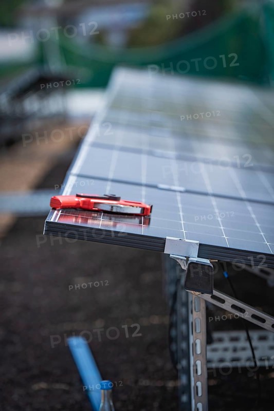 Solar modules and tools on a rack, detailed view of an installation, new Park and Ride Calw Heumaden car park on the new Hermann Hessebahn, Calw, Germany