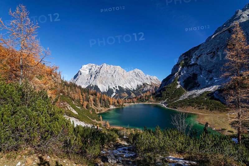Seebensee with Zugspitze and Wetterstein Mountains in autumn, Alps, Tyrol, Austria