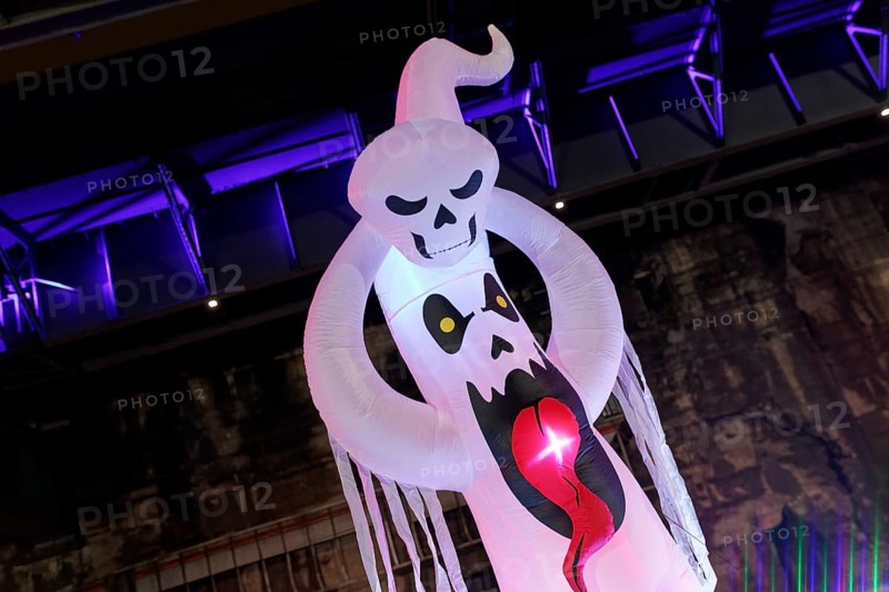 Illuminated ghost figure at Halloween Run, night run in the Dusiburg-Nord Landscape Park, Duisburg, Germany, North Rhine-Westphalia, Germany