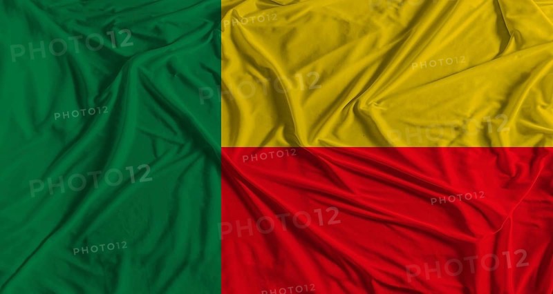 Benin flag with fabric texture background. National flag of Benin with cloth texture