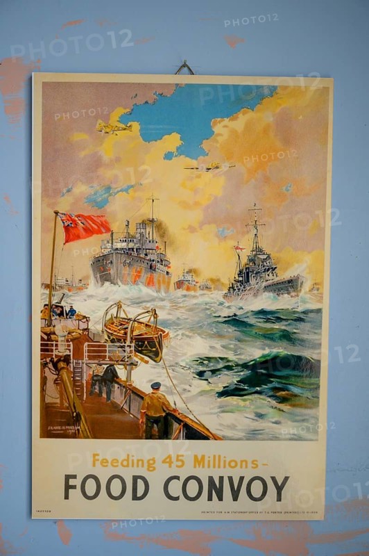 Propaganda poster of a convoy fleet with stormy sea and clouds, in the Partisan Museum in the old school in Kiberg, Troms, Norway