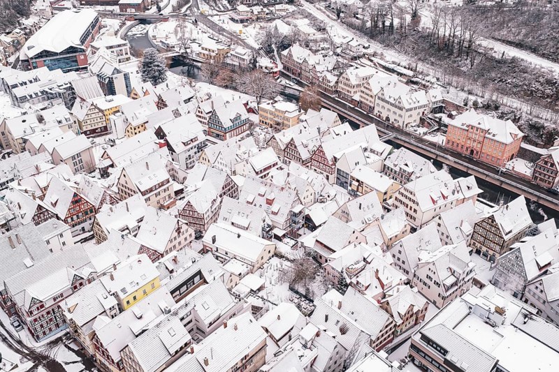 Snowy old town with half-timbered houses from a bird's eye view, winter atmosphere, Calw, Black Forest, Germany