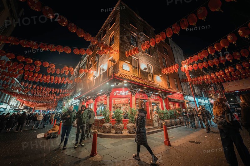 Bustling street scene in Chinatown with red lanterns, China Town, London, England, Great Britain