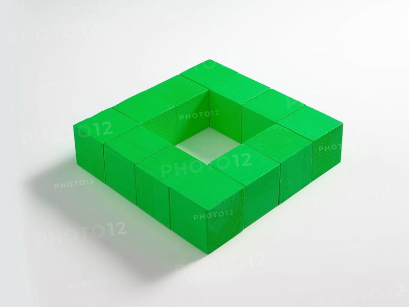 12 green wooden cubes against a white background