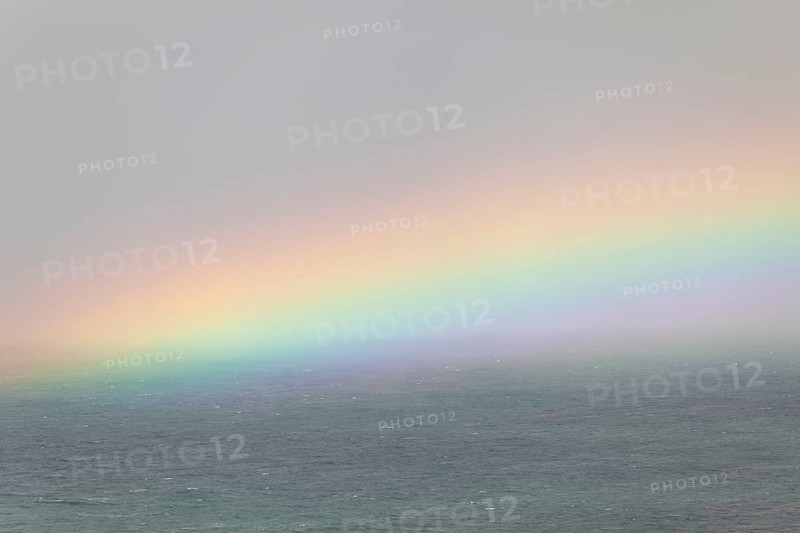 Tallow Beach bay with rainbow, lookout Byron Bay lighthouse, New South Wales, Australia