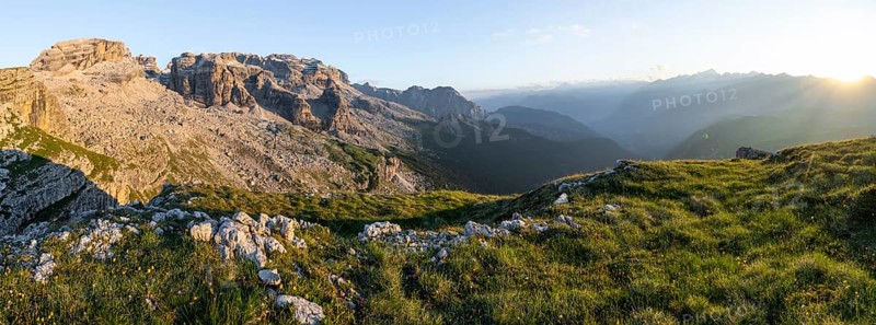 Panorama, view of rocky mountain peaks of the Brenta Mountains in the evening light, sunset over the Adamello Group, mountain landscape on the Grosté Plateau, Brenta-Adamello Natural Park, Trentino, Italy