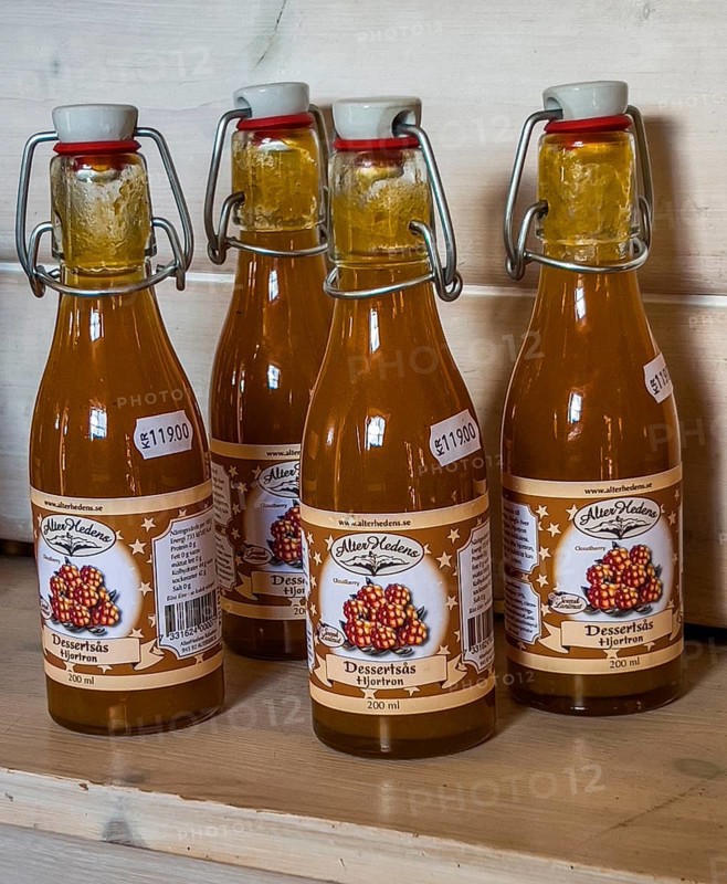 Swedish souvenir: cloudberry juice in a bottle in Smålandet Moose park in Markaryd, Småland County, Sweden, Scandinavia