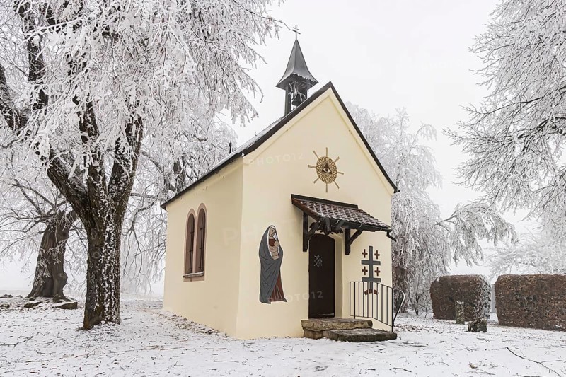 Schoenstatt Chapel Ennabeuren with hoarfrost in winter. Tourist attraction in the Swabian Jura. Heroldstatt, Baden-Württemberg, Germany