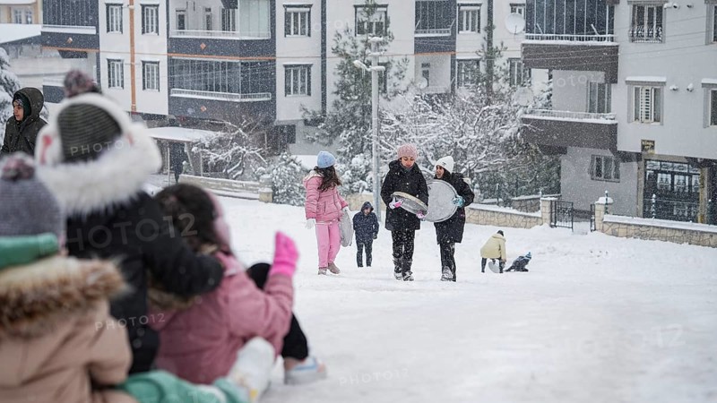 In Gaziantep, Turkey, on December 31, 2025, children and families enjoy winter activities as they play on snow-covered areas and slide on icy hills, creating a lively atmosphere across the city during the final day of the year, Gaziantep, Gaziantep, Turkey