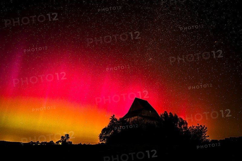 Colourful polar lights over the EXPO observatory in front of a starry night, EXPO Observatory, Oberholsten, Melle, Lower Saxony, Germany