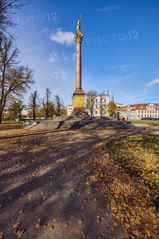 Victory column, general architecture, houses, trees with autumn leaves, meadow, fallen leaves, blue sky, cumulus clouds, cirrostratus clouds, Schwerin, state capital, district-free city, Mecklenburg-Western Pomerania, Germany