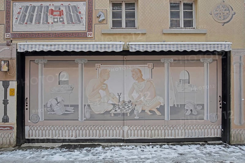 Historical wall by artist group Kollektiv K 2020, historical paintings on the history of the city, contemporary history, house façade, street art, mural, Roman period, Romans with chess set, eels, Swabian Jura, Baden-Württemberg, Germany