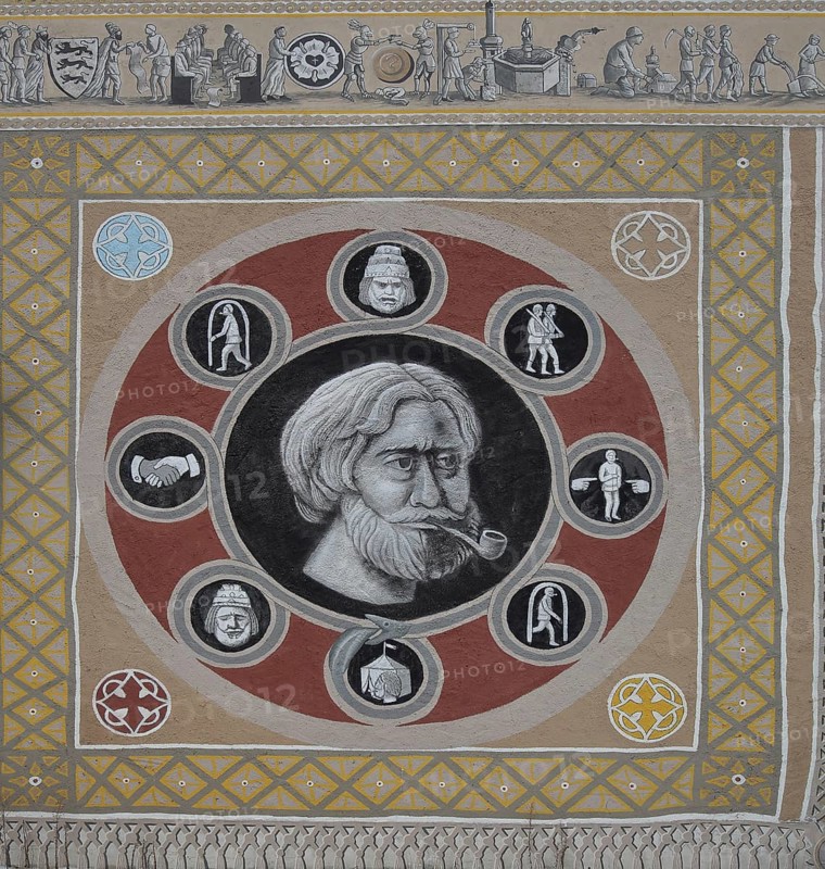 Historical wall by artist group Kollektiv K 2020, historical paintings on the history of the city, contemporary history, house façade, street art, mural, circle, square and head with pipe, eels, Swabian Jura, Baden-Württemberg, Germany