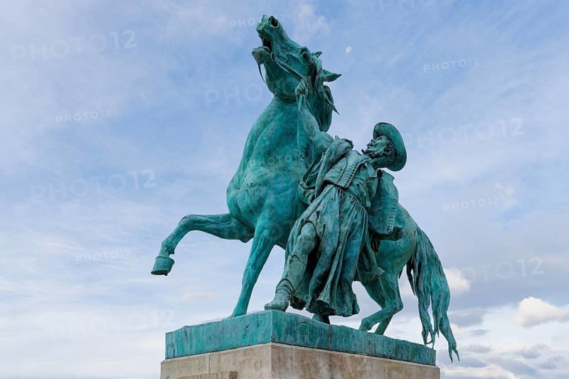 Buda Castle, Statue of the Horseherd taming a wild horse in front of the Riding Hall, Budapest, Hungary