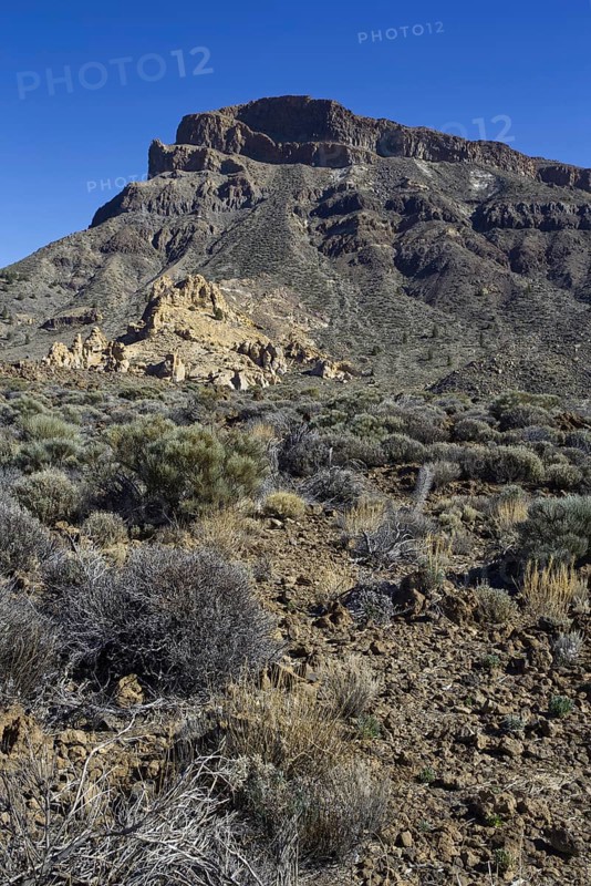 Mountain scenery in a rocky desert landscape under clear sky, Pico del Teide National Park, La Orotava Tenerife