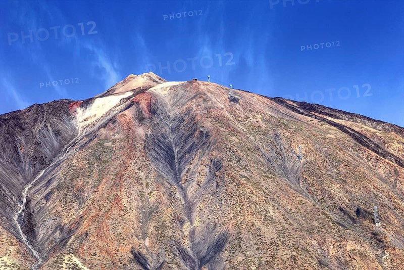 Close-up of Pico del Teide peak under blue sky, Pico del Teide National Park, La Orotava Tenerife