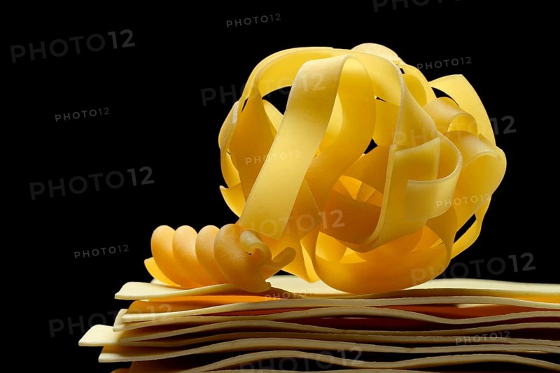 Uncooked lasagna sheets, fettuccine and fusilli