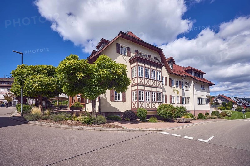 Gasthaus Lime tree, restaurant, hotel, house, general architecture, lantern, streets, pavement, trees, Southern Catalpa (Catalpa bignonioides), blue sky, cumulus clouds, intersection main street with Unterdorf, Hofstetten, Black Forest, Ortenaukreis, Baden-Württemberg, Germany