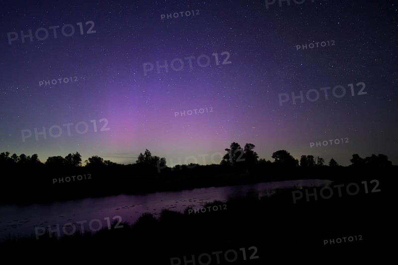 Aurora borealis aurora borealis on the Hunte dyke, Dümmerniederung nature park Park, Lower Saxony, Germany