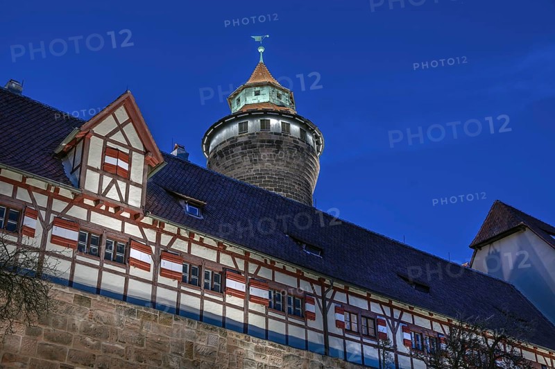 Sinwell Tower built in the 13th century, on the Nuremberg Kaiserburg in the evening lighting, blue evening sky, Mount of Olives, Nuremberg, Middle Franconia, Bavaria, Germany
