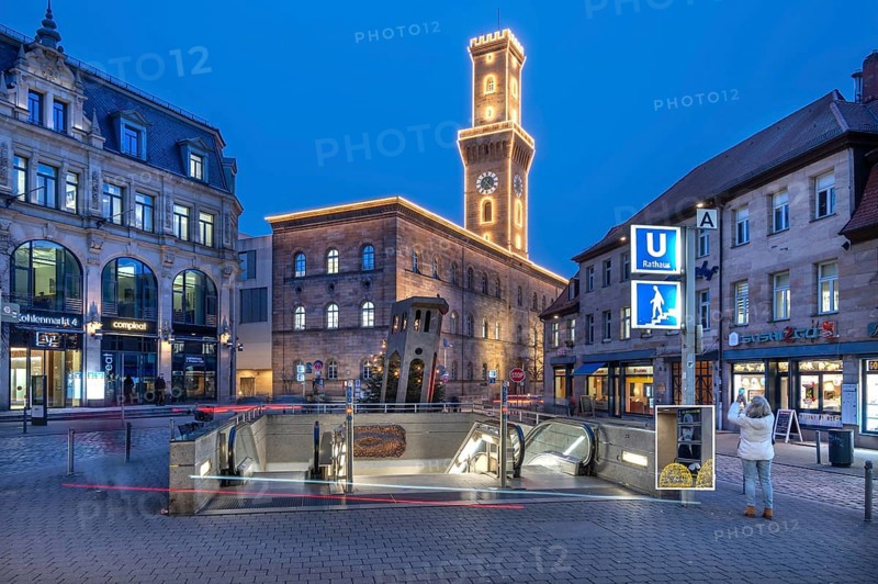 Fürth Town Hall in evening lighting, the tower is imitated the tower of the Palazzo Vecchio in Florence, in front a subway entrance, blue evening sky, Fürth, Middle Franconia, Bavaria, Germany