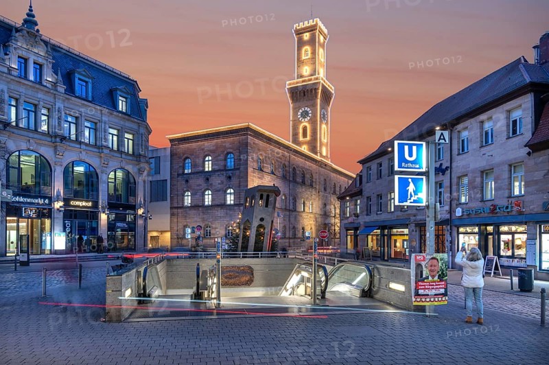 Fürth Town Hall in evening lighting, the tower is imitated the tower of the Palazzo Vecchio in Florence, in front a subway entrance, evening sky, Fürth, Middle Franconia, Bavaria, Germany