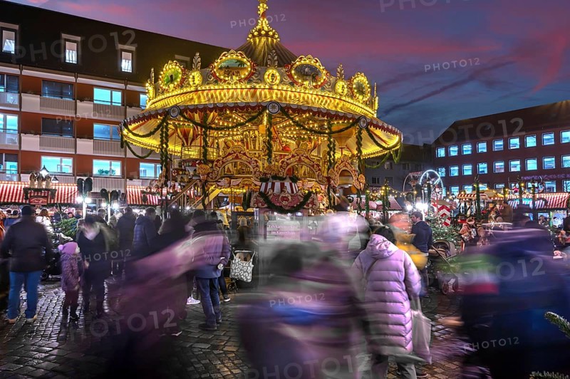 Nostalgic children's carousel at the children's Christmas market in the evening, Hans-Sachs-Platz, Nuremberg, Middle Franconia, Bavaria, Germany