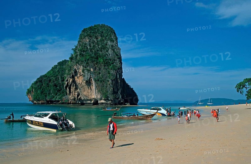 Rocks in the sea, boats and people on Pranang Cave beach, two years in front of the tsunami, Krabi, Thailand, December 2002, vintage, retro, old, historic