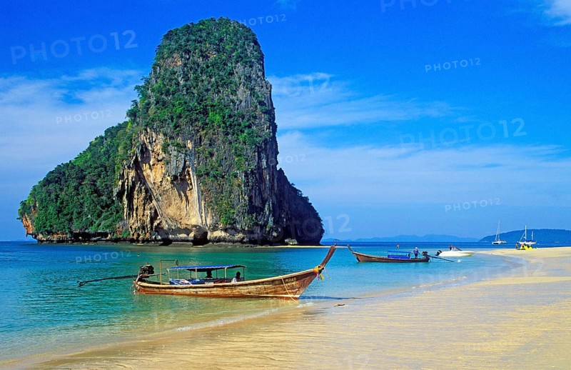 Rocks in the sea and longtail boats on Pranang Cave beach, two years in front of the tsunami, Krabi, Thailand, December 2002, vintage, retro, old, historic
