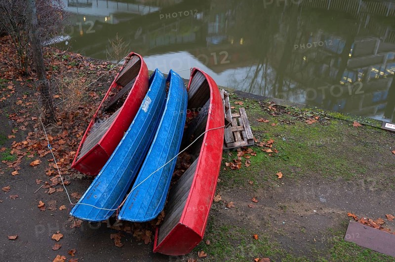 Assembled rowing boats on the banks of Pegnitz, river in Nuremberg, Middle Franconia, Bavaria, Germany