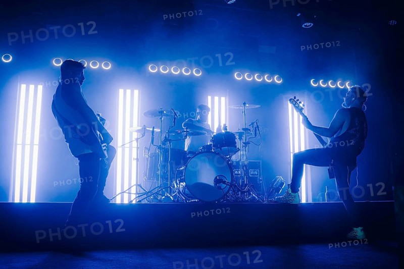 Bass player Chris Wendel, drummer Yuri Cernovolov and guitarist Ramin Tehrani from Engst live on 10-year anniversary tour tour at Berlin's Astra Kulturhaus on 20.12.2025