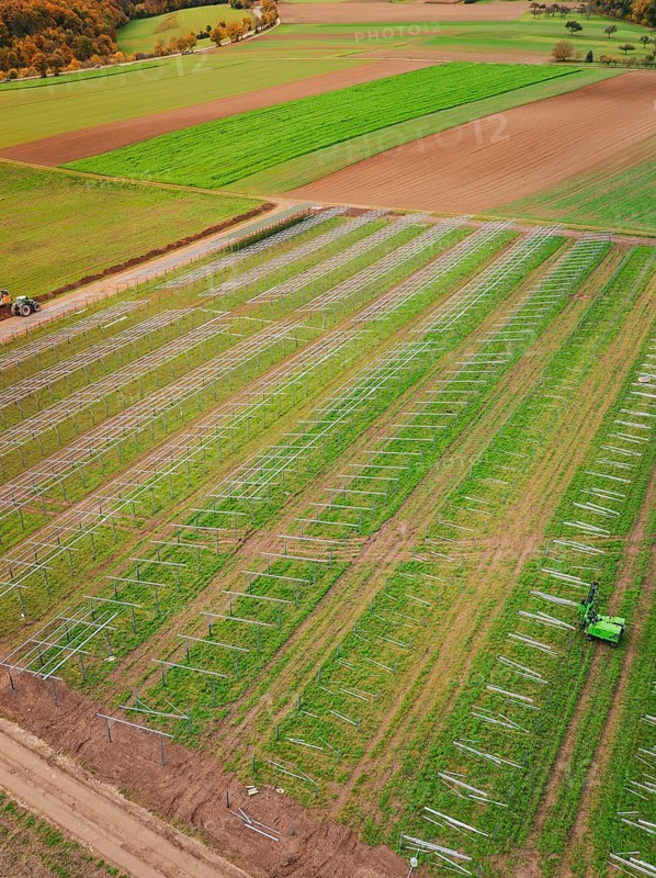 Aerial view of fields with solar frame on green fields, energy transition, construction of PV open space, Baden-Württemberg, Germany