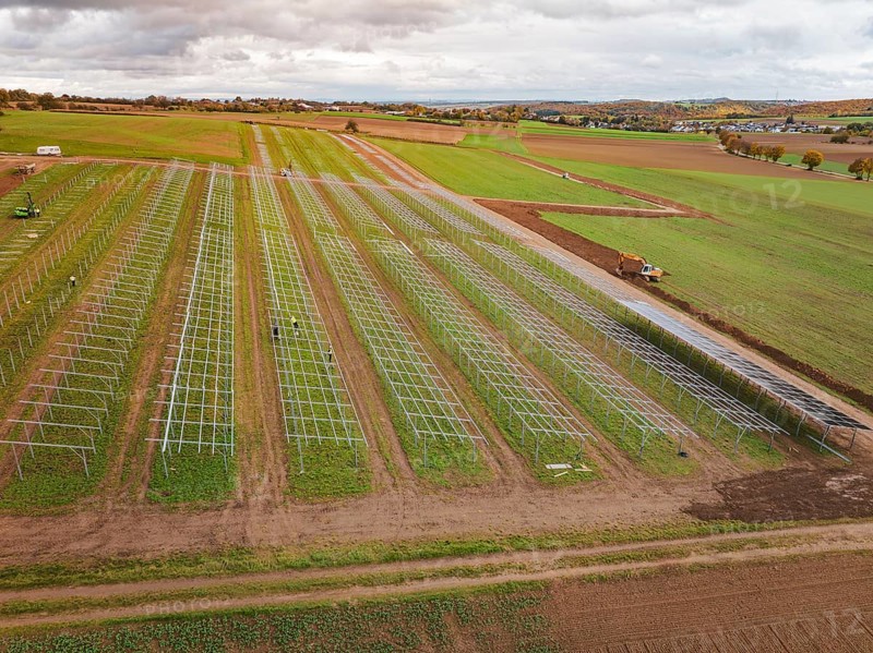 Aerial view of a solar plant under construction on extensive fields, energy transition, construction of PV open space, Baden-Württemberg, Germany
