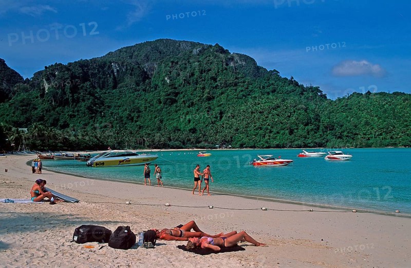 People, boats on the beach of Ko Phi Phi Don, two years in front of the tsunami, Thailand, December 2002, vintage, retro, old, historic