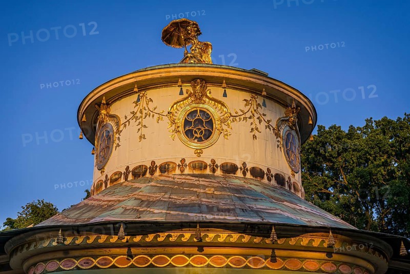 Chinese house in the evening light, tea house with golden sculptures, Sanssouci Park, Potsdam