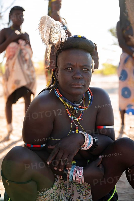 Portrait, brightly decorated woman of the Hakaona tribe, also Havakona or Hakawona, near Opuwo, Kunene, Namibia